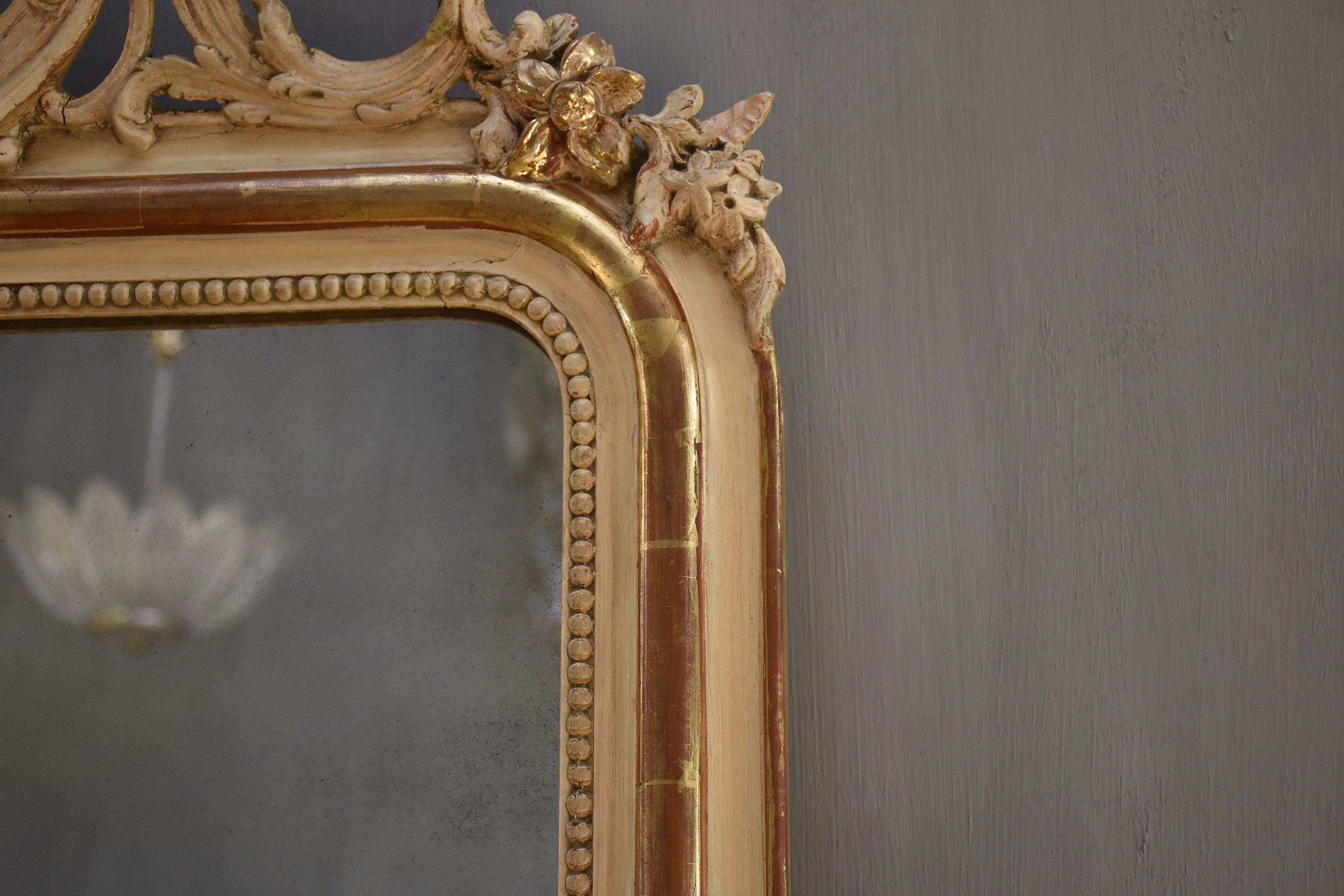 19th c. French mirror with a beautiful crest