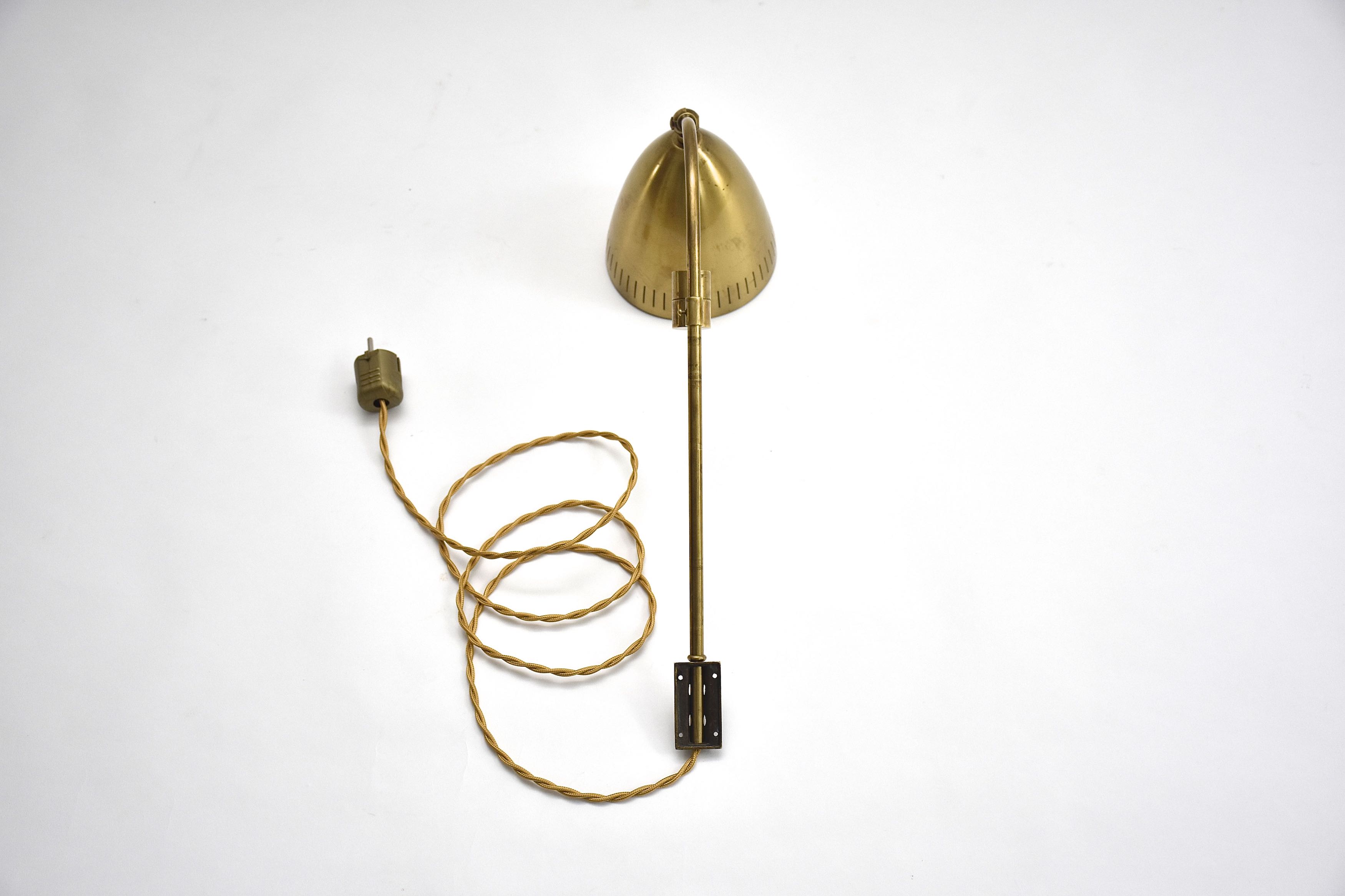 Mid-century Swedish brass wall lamp