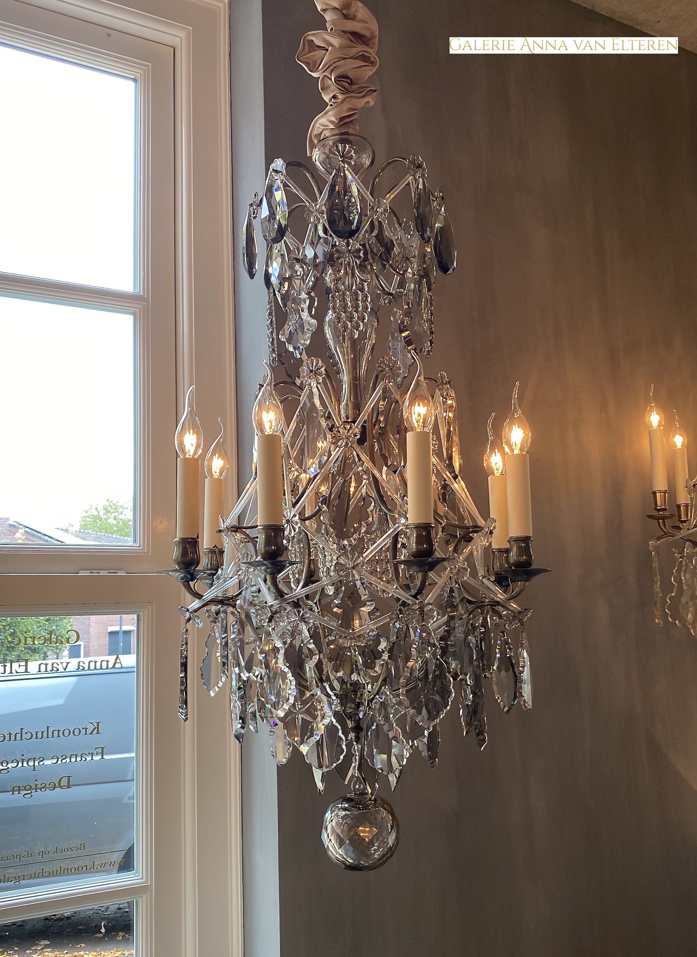 Rococo style crystal chandelier with soft coloured crystals